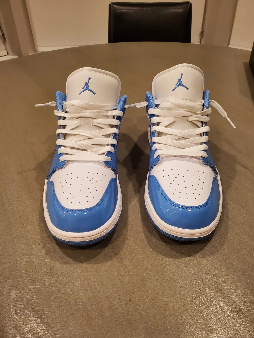 Jordan 1 Low Top Sneakers White and University Blue